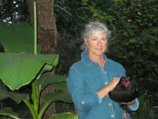 Jude Hobbs holding a chicken

